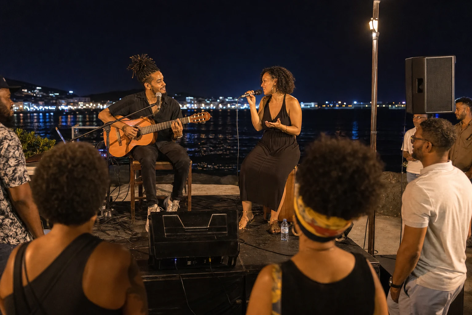 Musicians performing beside the Atlantic at Marina da Praia